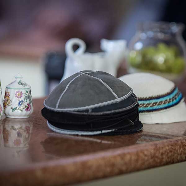 Yarmulkes on a table.